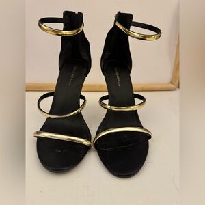 Bebe Elegant Black Heels with Gold Straps